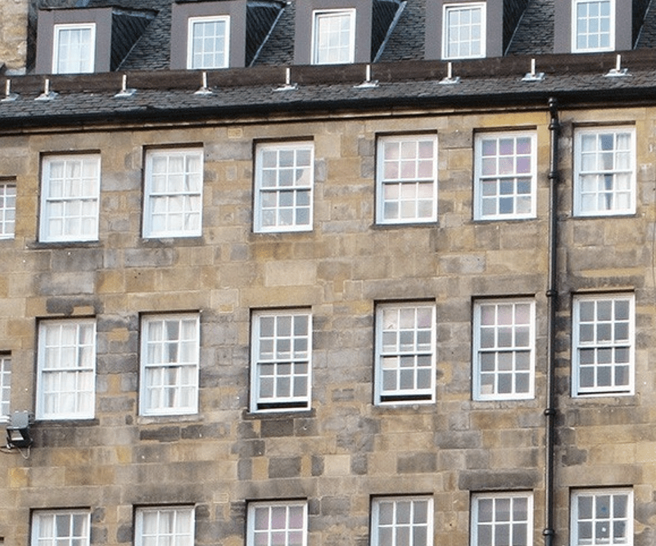 Close up of some traditional Edinburgh tenement windows.